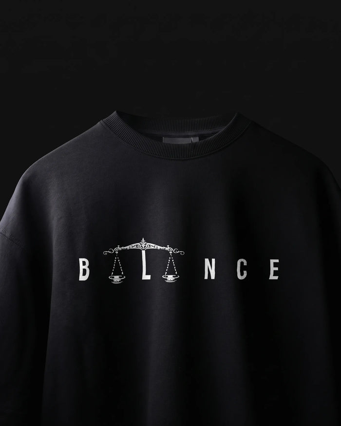 Equilibrium oversized streetwear t-shirt front view with balance graphic print, VDesignzDrop India