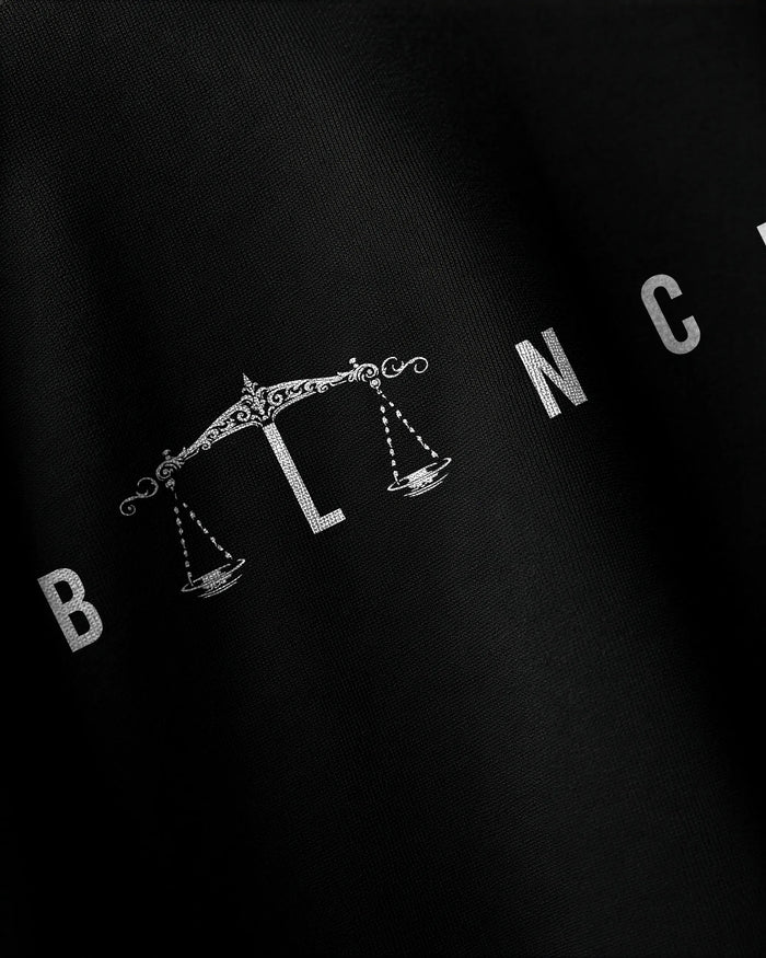 Close-up balance graphic print detail on Equilibrium oversized t-shirt by VDesignzDrop