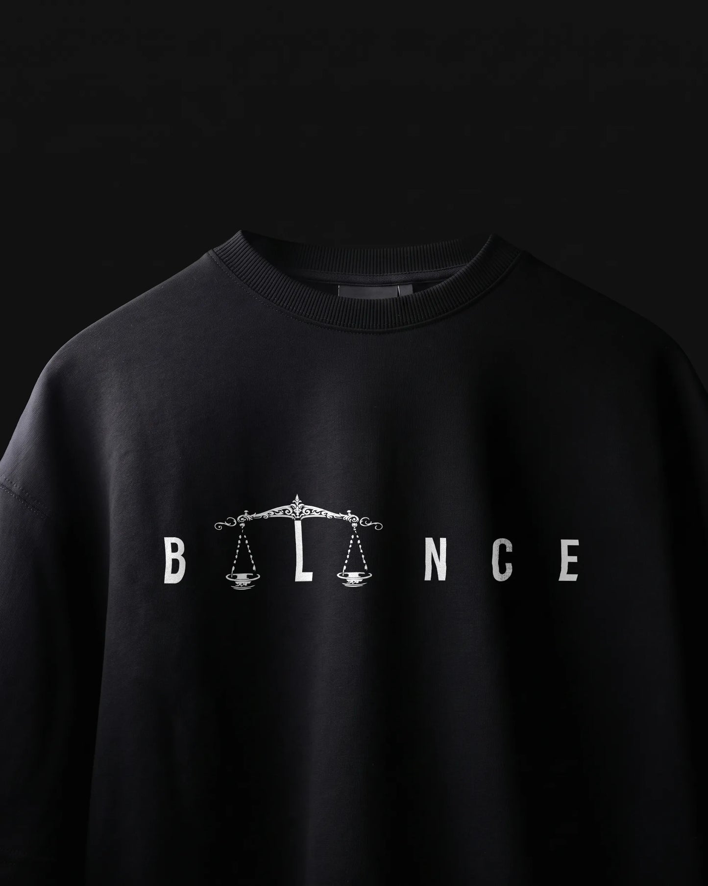 Equilibrium oversized streetwear t-shirt front view with balance graphic print, VDesignzDrop India